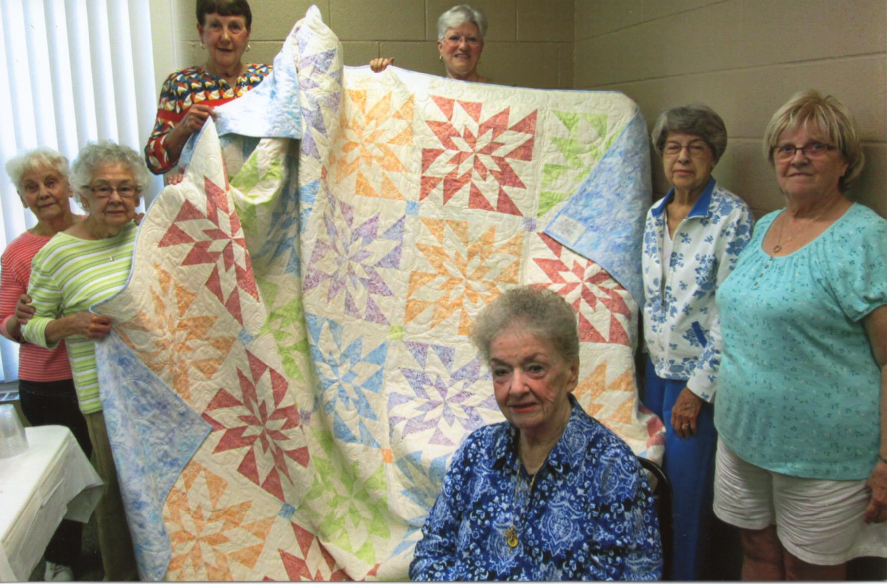 Clockwise from top left: Betty P., Carol N., May R., Audrey M., Rita P., Helen C., and Betty L.