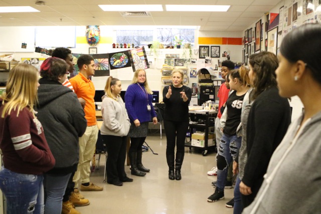 Photo: wrkxfmly Photo Facilitator Joanne Miller works with students at Elkton High School in Lanham, Maryland