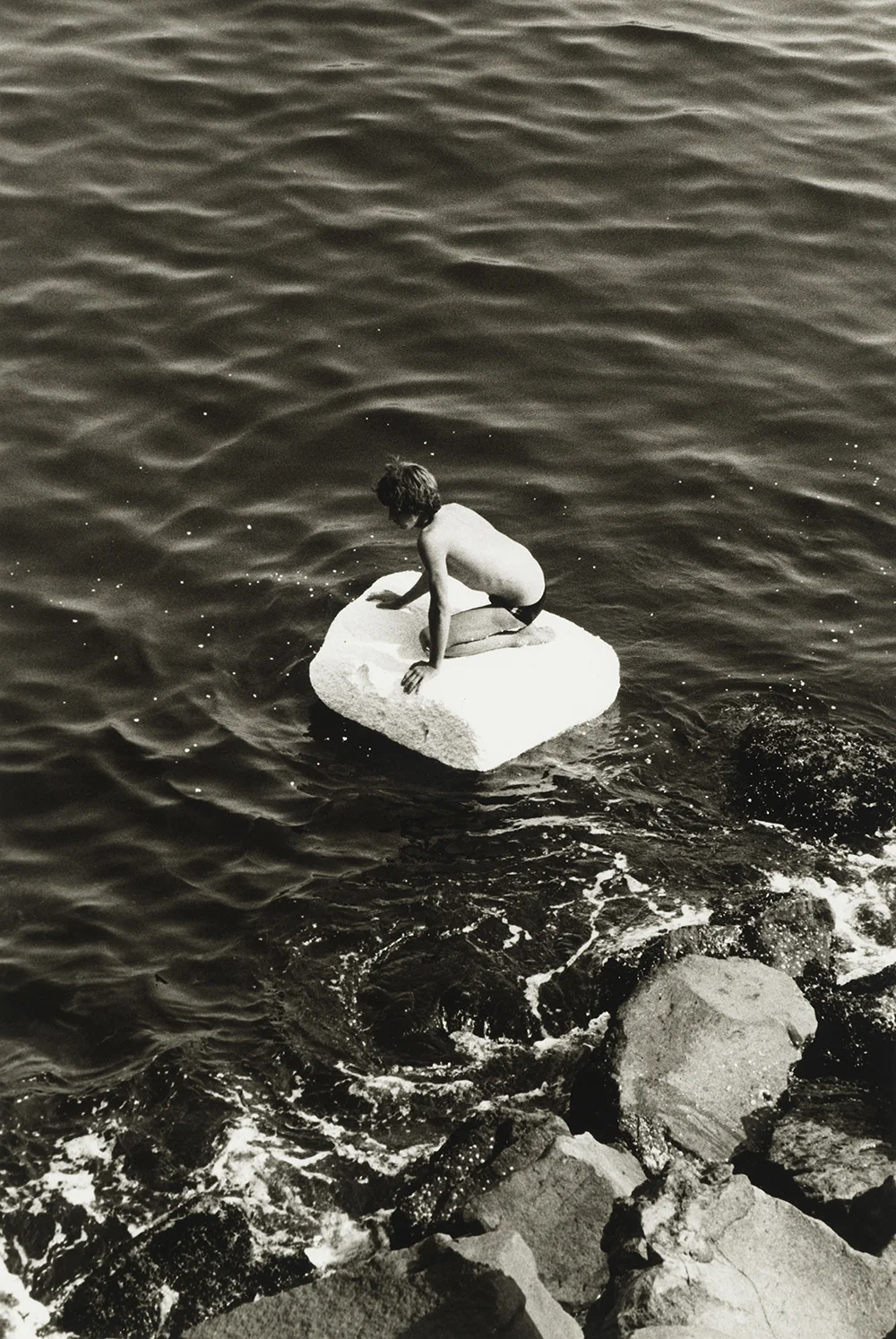 Boy On Raft (1978) © Peter Hujar Archive, LLC, courtesy Pace/MacGill Gallery, New York and Fraenkel Gallery, San Francisco