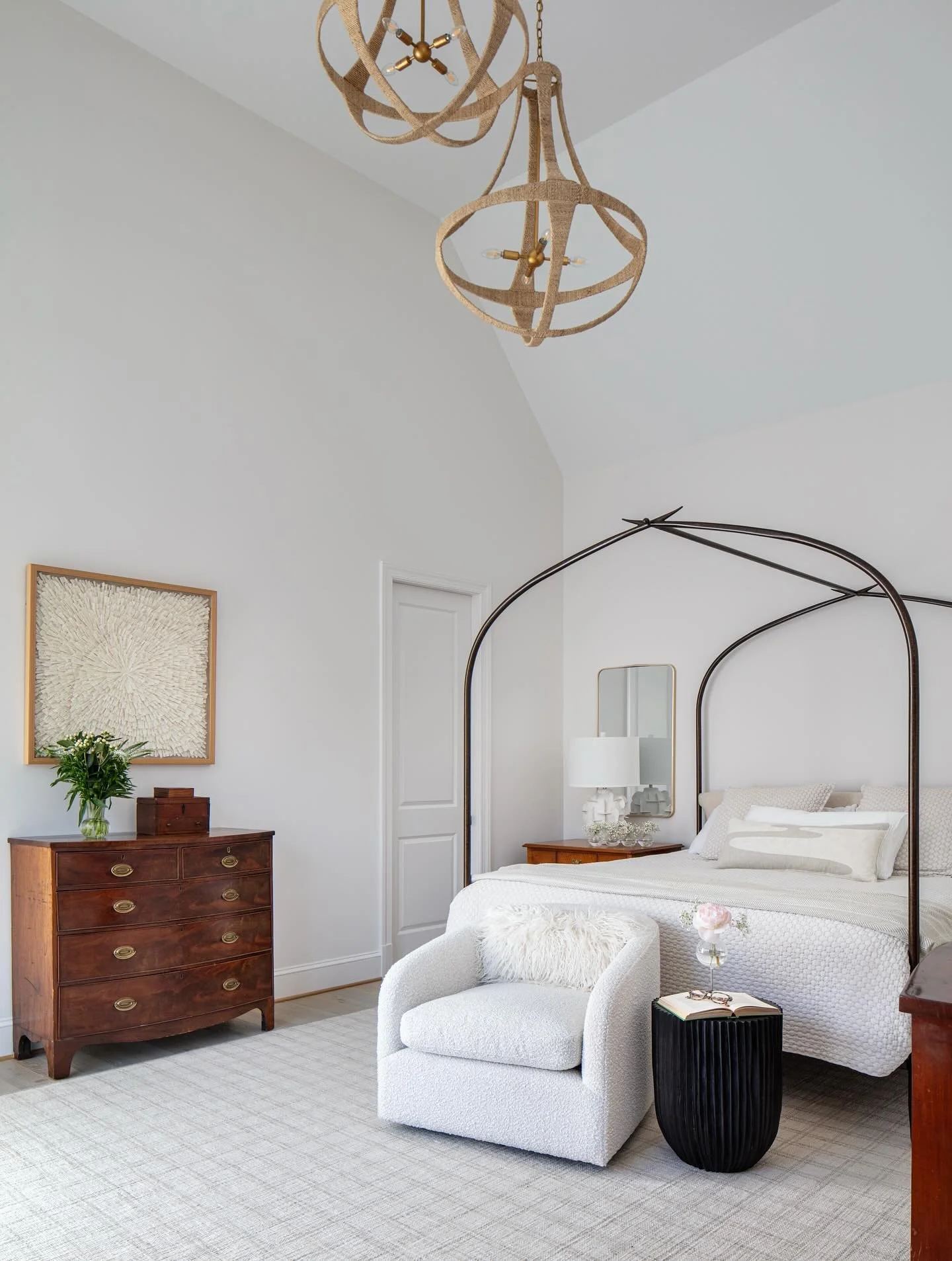 Vaulted ceilings and a dramatic bed go hand in hand.