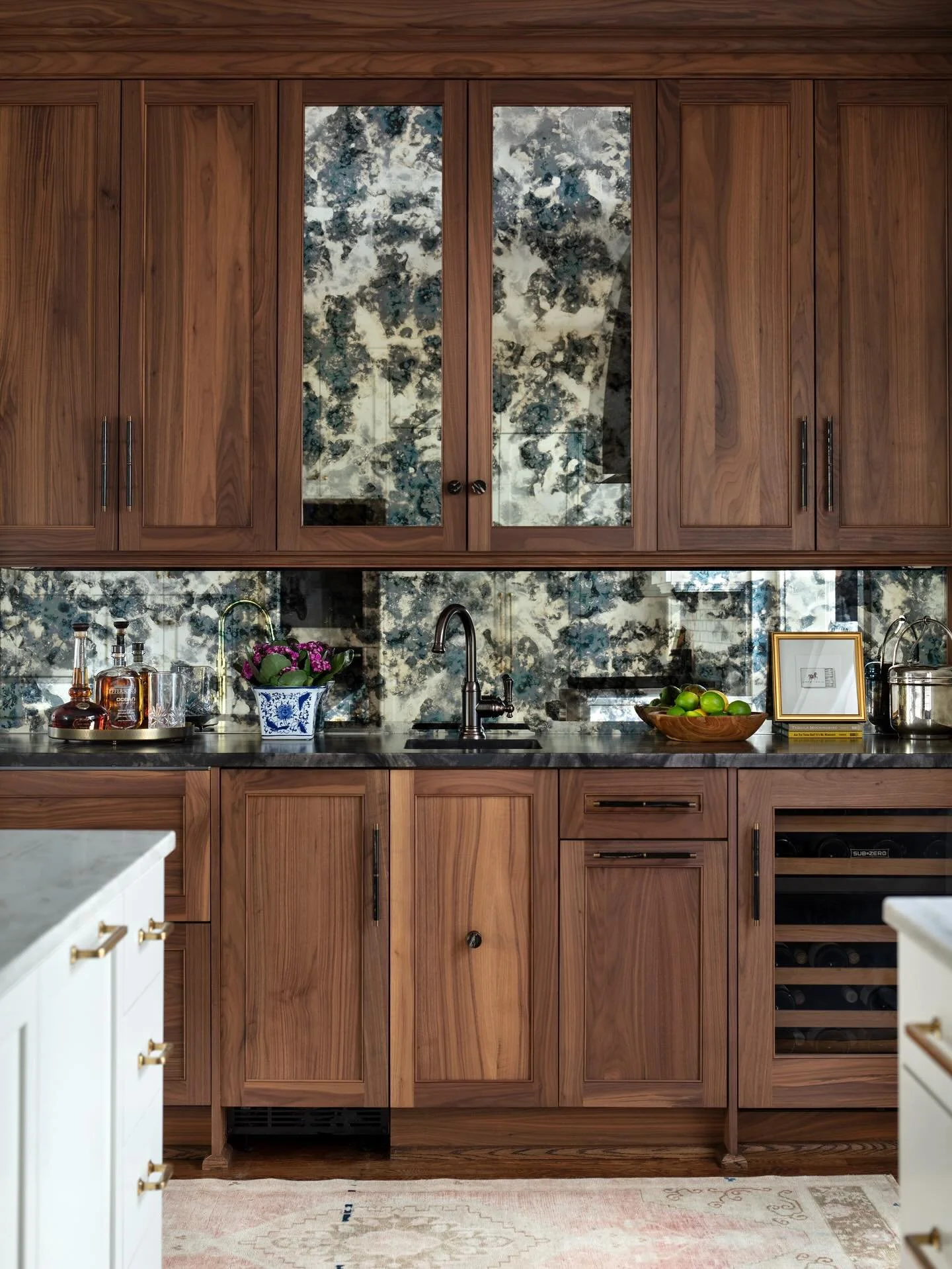 Dark wood paired with antique mirror? Yes please!