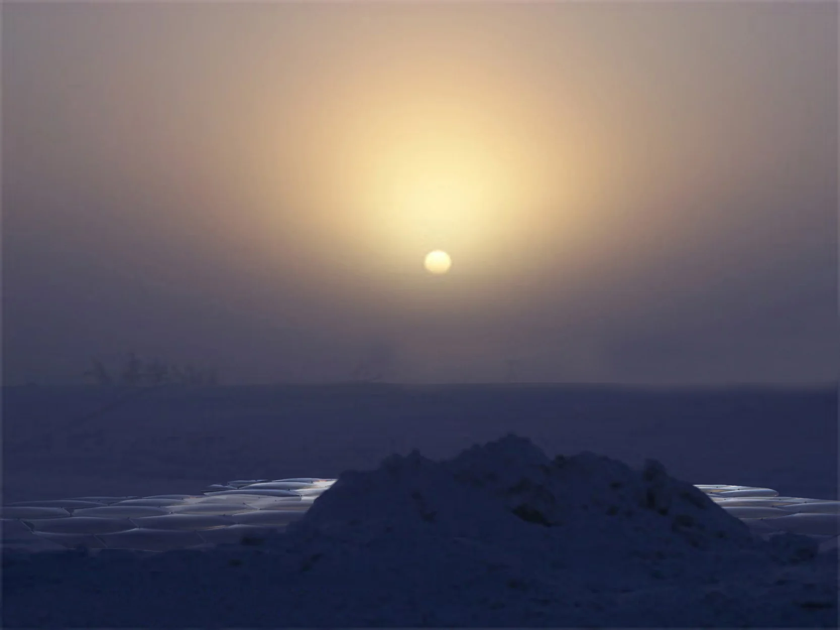 Glinting in the ice fog