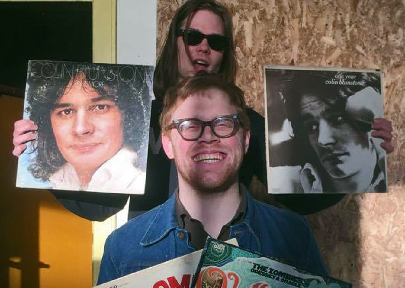 Amos Pitsch with Tenement bassist Jesse Ponkamo and some favorite Zombies-related LPs. Photo by Black Thumb.