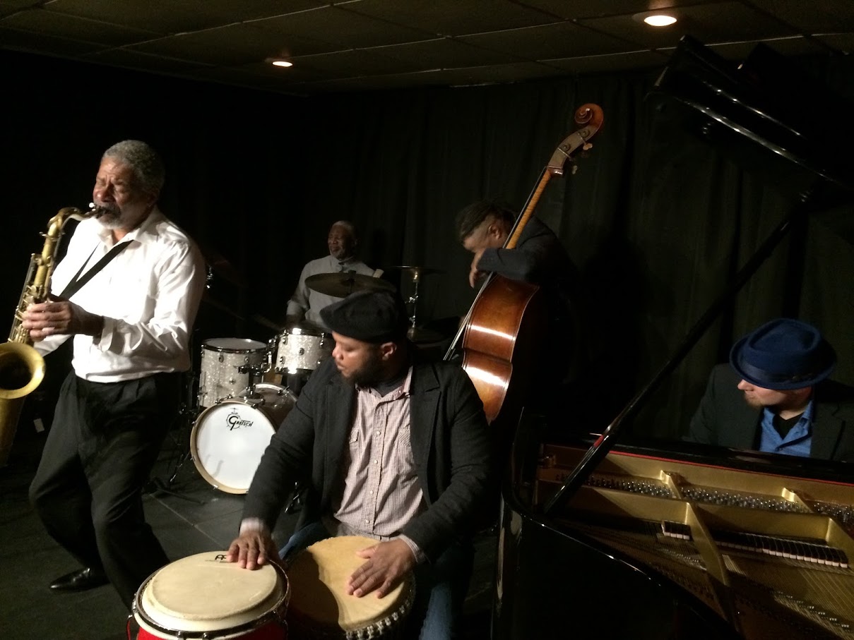 Hanah Jon Taylor and friends break in Café Coda in February. Photo by Robin Davies.