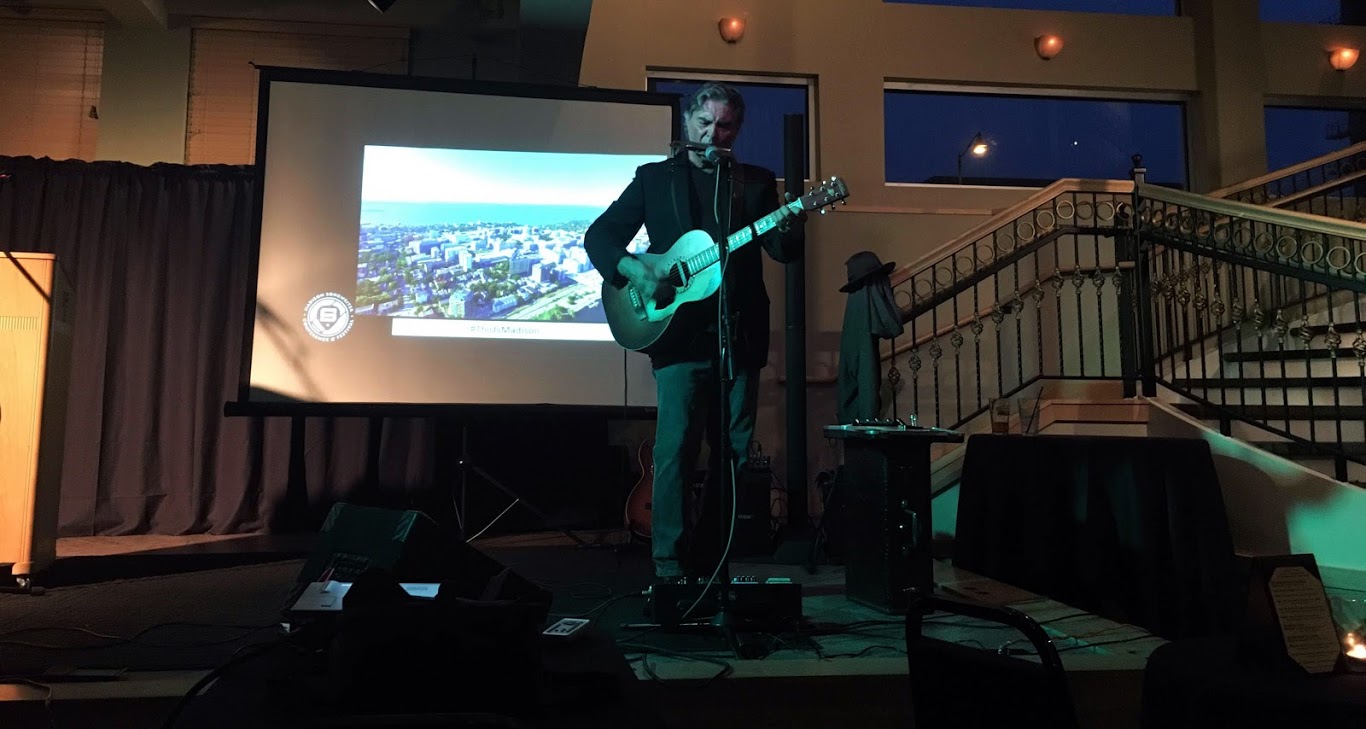 Madison singer-songwriter Robert J performed at Tuesday's event at the Brink. We're not sure if he brought his own PA.