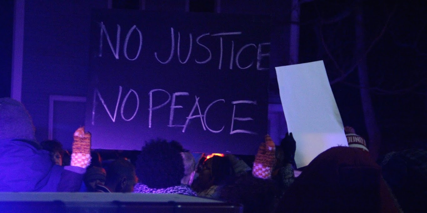 Madisonians protest the March 2015 killing of Tony Robinson by a Madison Police Department officer. Photo by Preston Austin via Flickr .