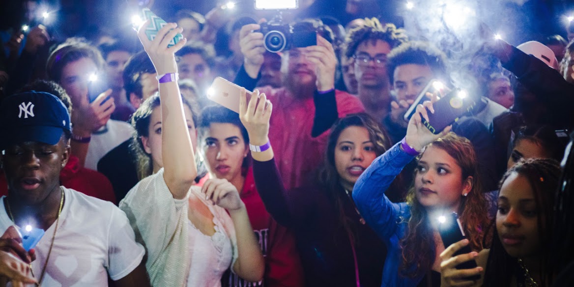 Attendees at a packed hip-hop show earlier this month at Lothlorien Co-op. Photo by dhvnsen .