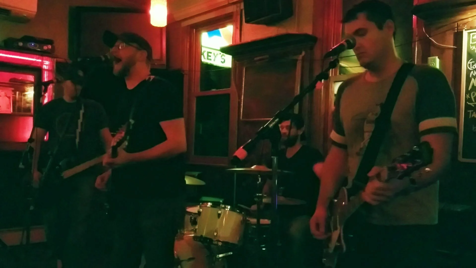 Rocket Bureau's live lineup consists of, from left to right, Dan Bornemann on bass, Kyle Urban on vocals and guitar, Paul Kennedy on drums, and Josh Labbus on guitar.