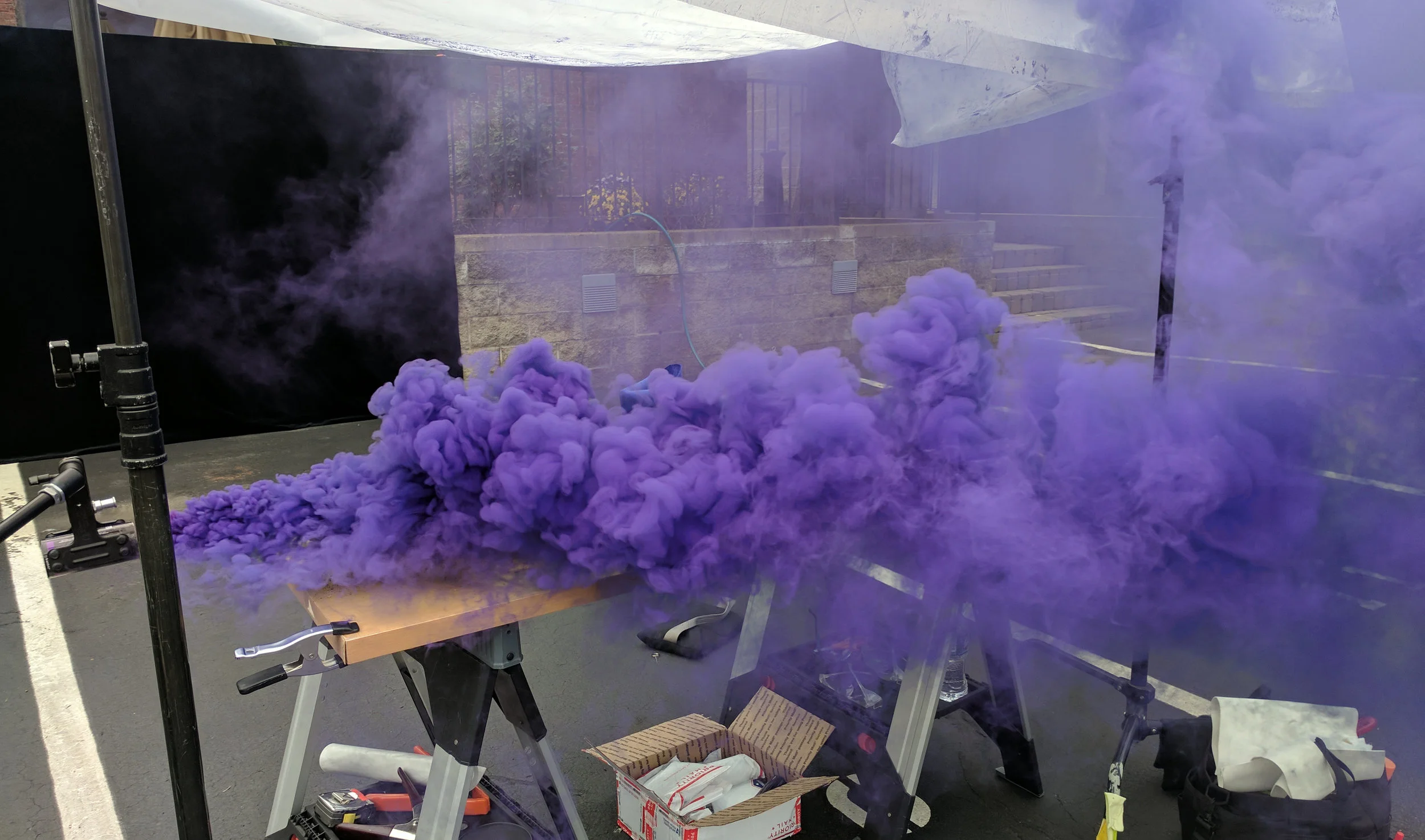  Indresano Studios sourced purple smoke bombs to create the effect of "violet haze" drifting around the boot. Set up in their parking lot, the team used fans to direct the smoke for each of the shots and videos.   