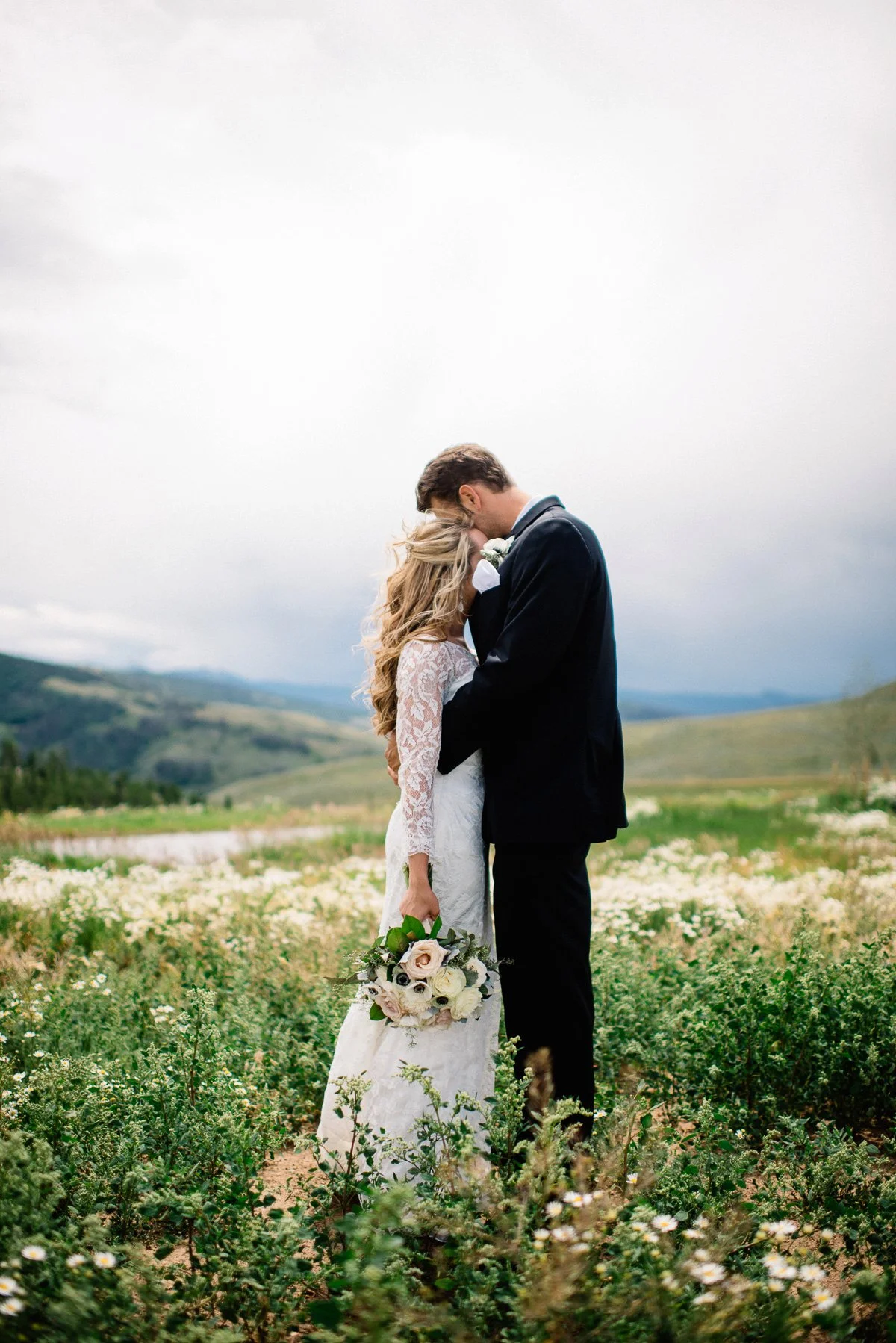 couple destination wedding photography at strawberry creek ranch in granby colorado