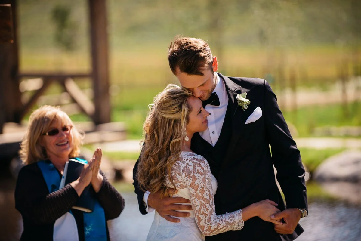 ceremony destination wedding photography at strawberry creek ranch in granby colorado