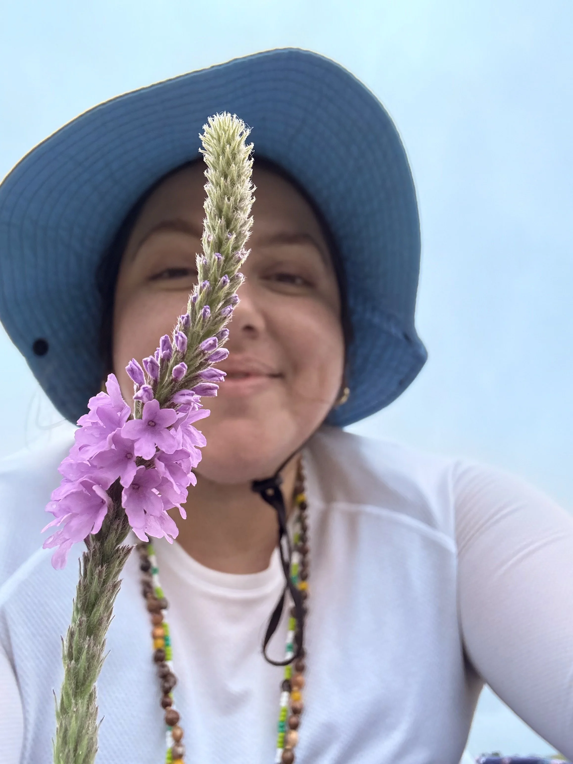 Katie with prairie flower.jpeg