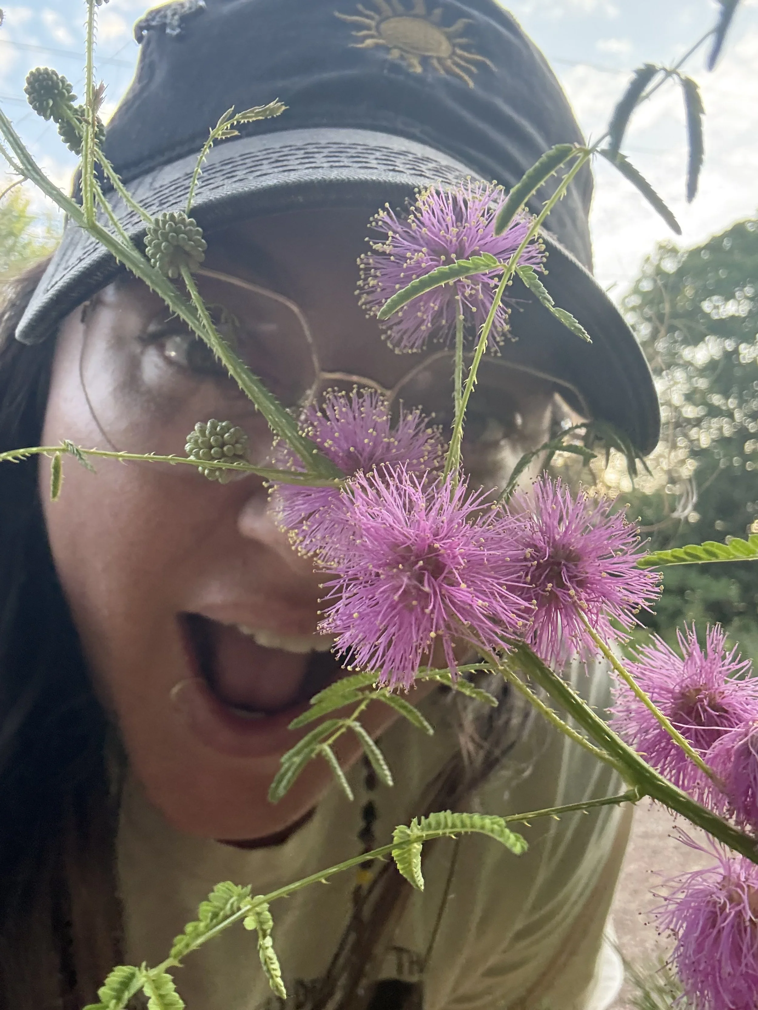 Katie_in front of mimosa.jpeg