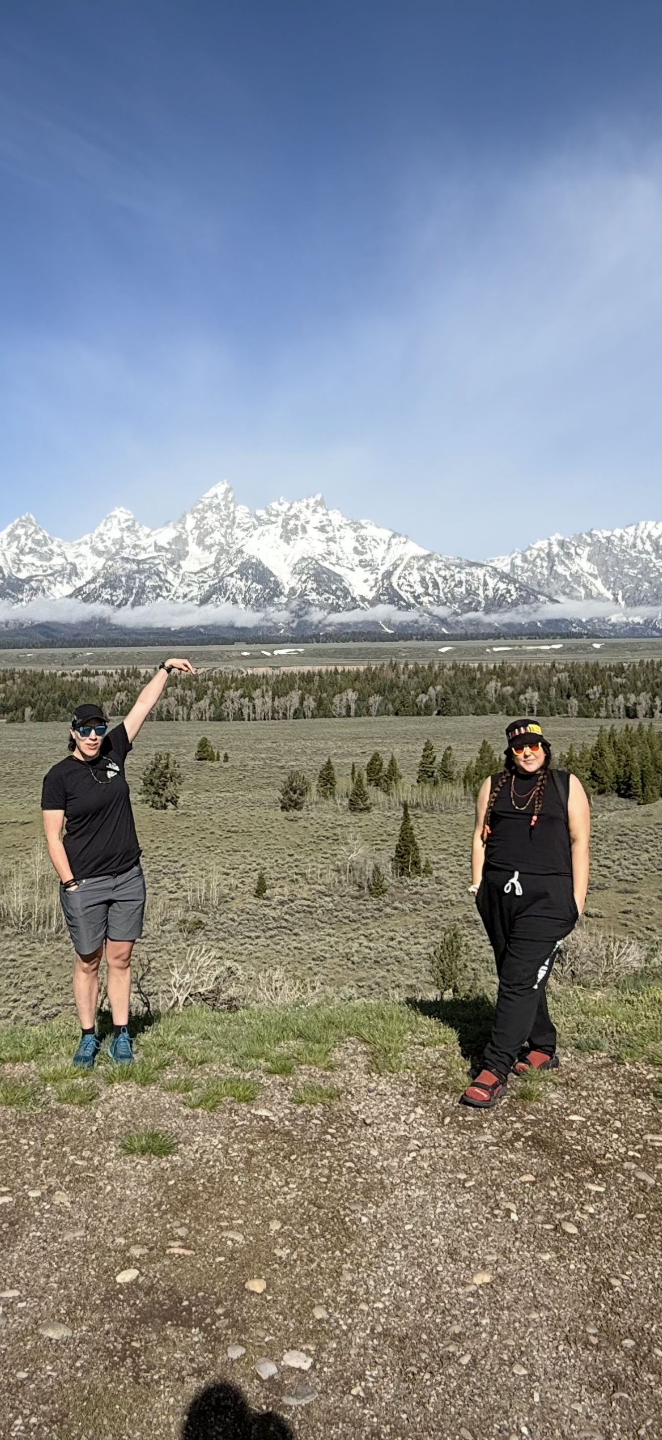 Corlee and Katie_Mountains in background.png
