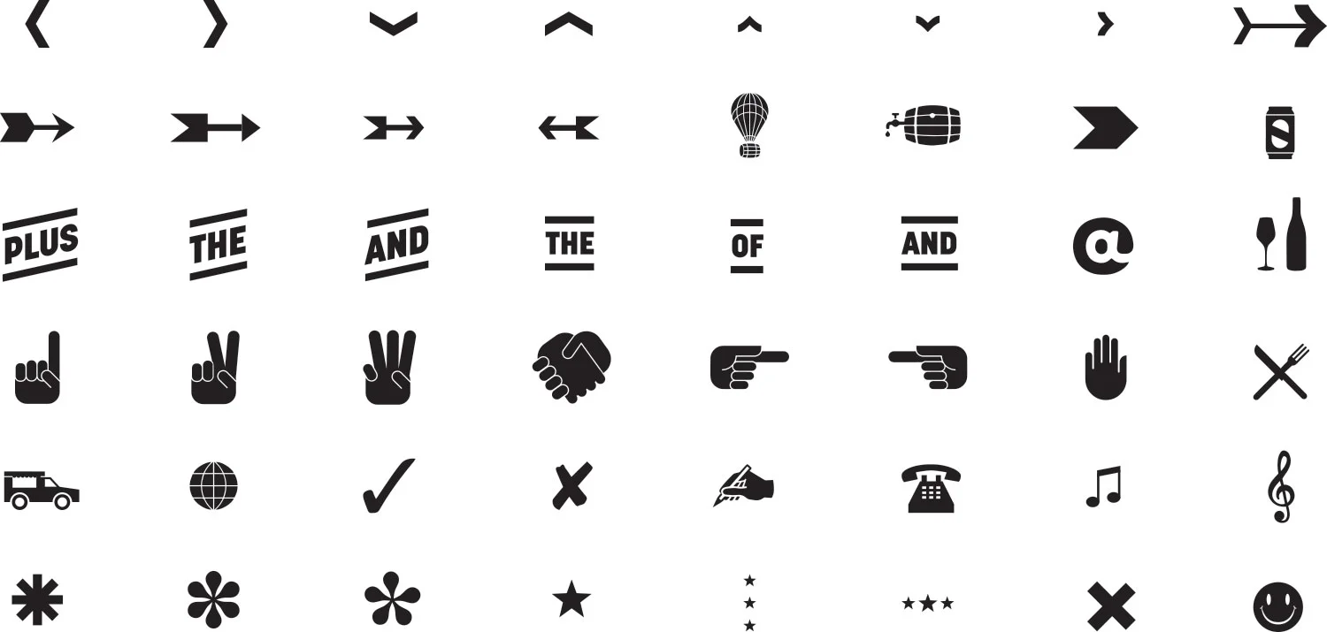 The look draws inspiration from military insignia and utilitarian graphics