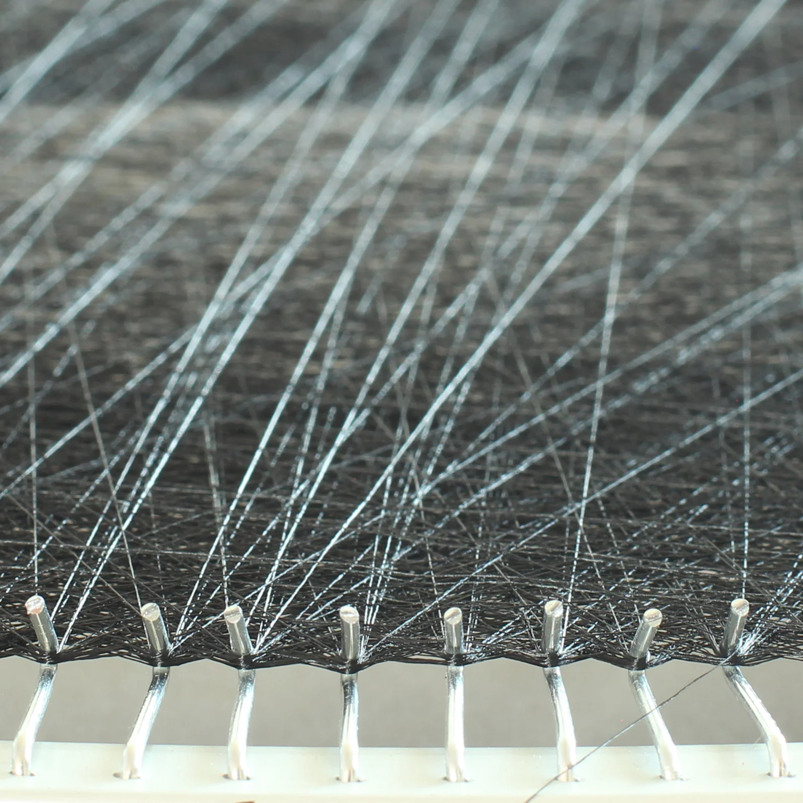 close-up-of-canvas-for-experimental-knitting.jpg