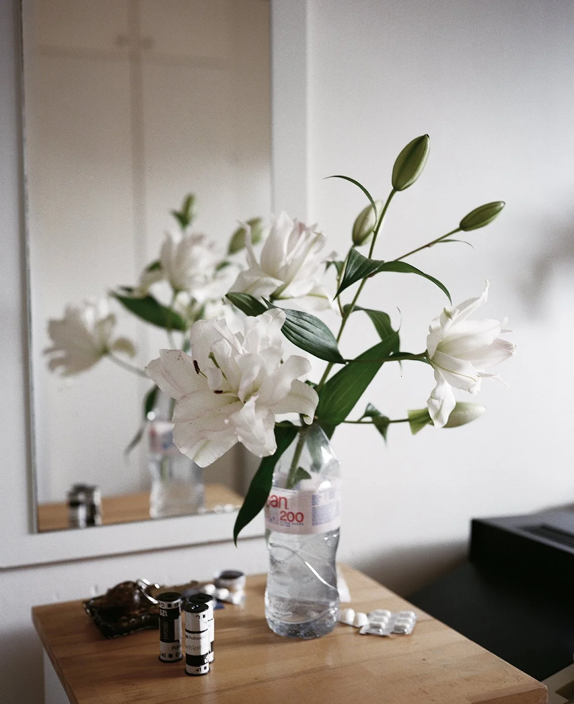    Untitled (Evian) , 2026  C-print, 40 × 32,6 cm 