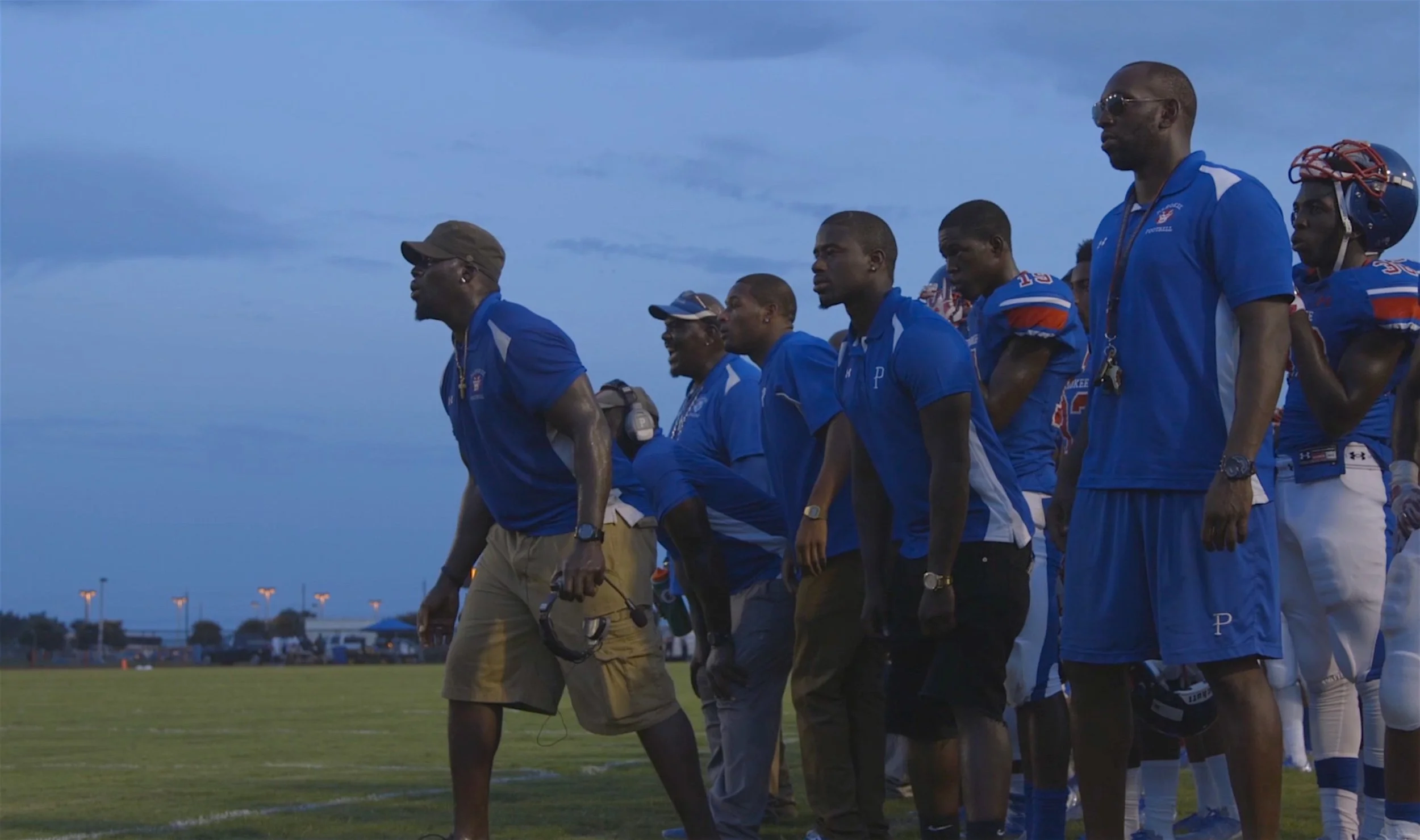 Alvin, Coaches and Players Watch the Action.jpeg