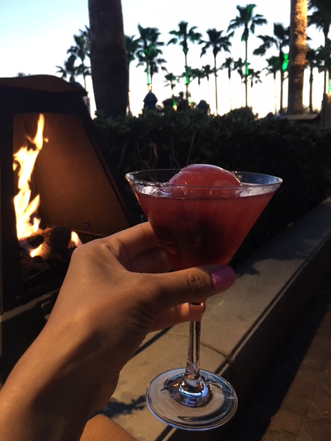 Southern Bramble drink by the fire pit at the Westin