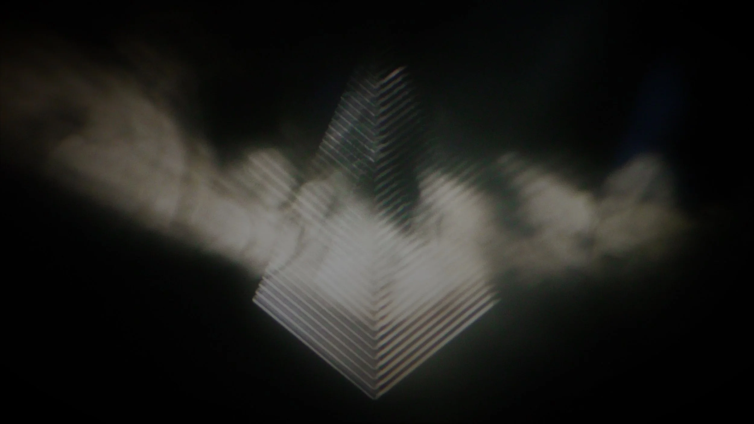 pic 003 - Kiasmos Projection Symbol.jpg
