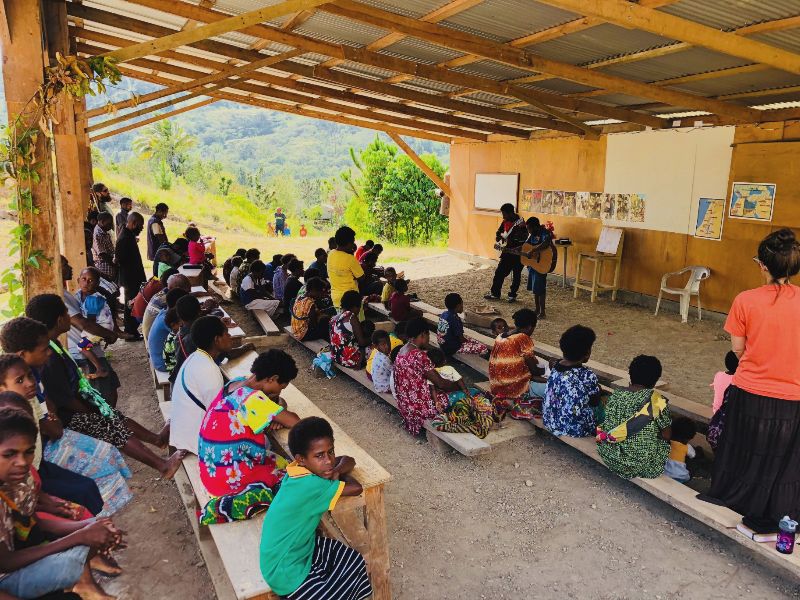 Menyan people gather to praise God and hear teaching from the Bible