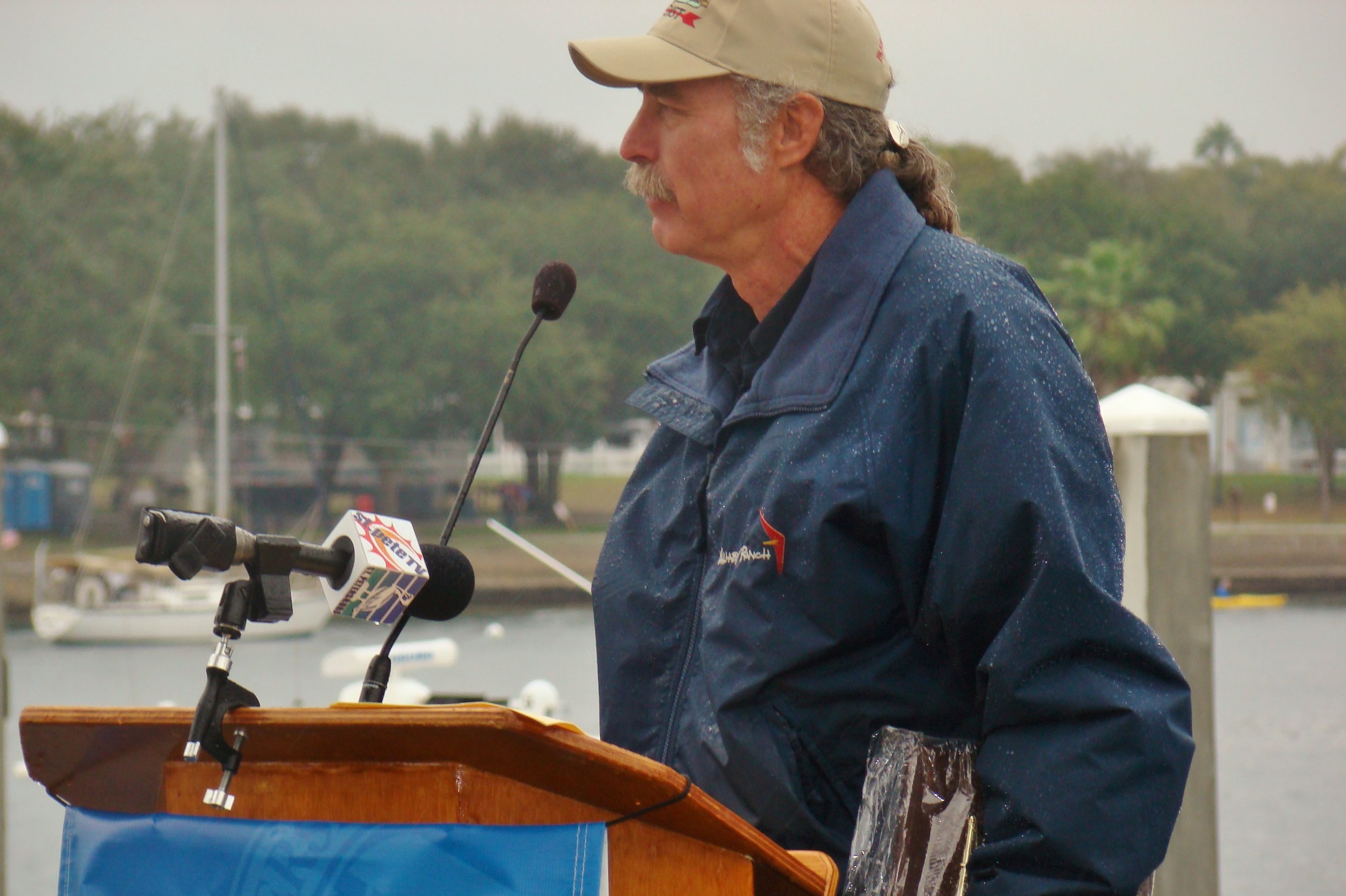 Kermit Weeks addressing Centennial Crowd in rain, 1 Jan '14.JPG