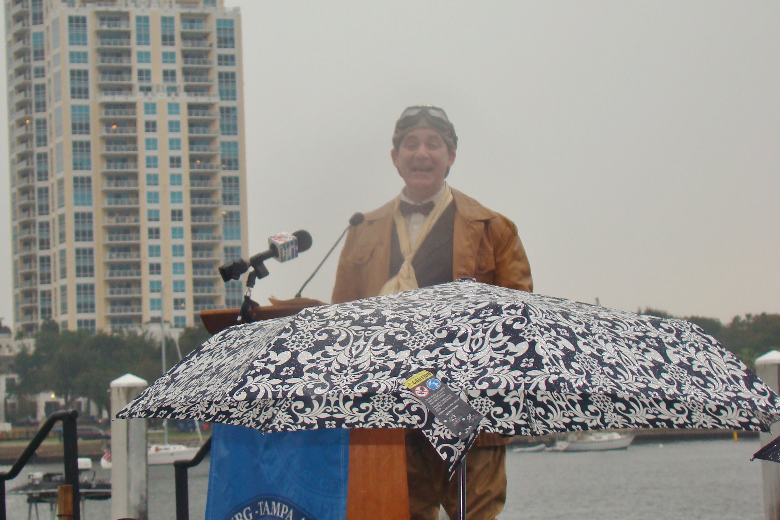 Tony Jannus - a. k. a., Michael Norton - addressing crowd in rain, 1 Jan '14.JPG