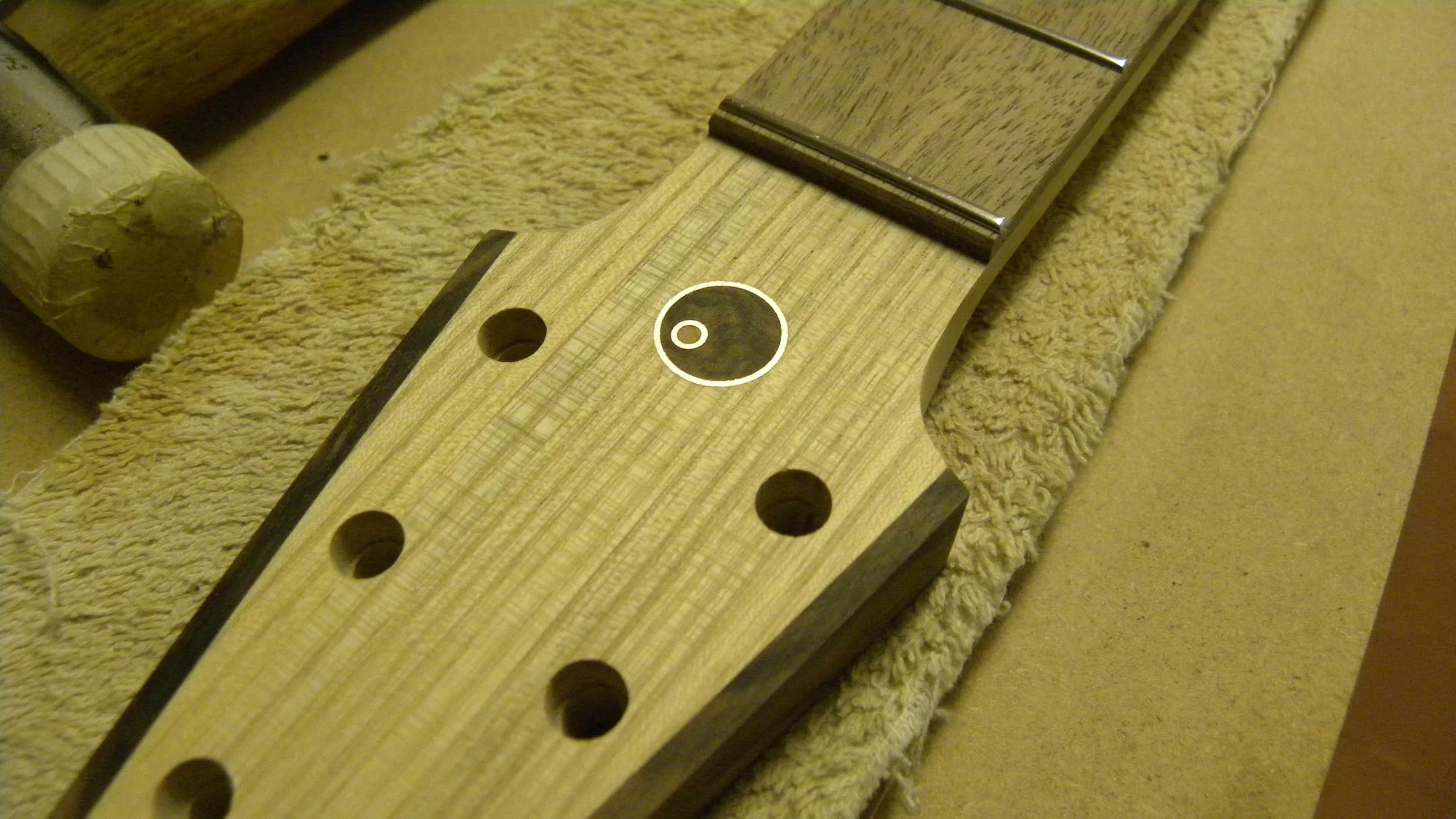0904 naiad1 headstock inlay3 ni web.jpg