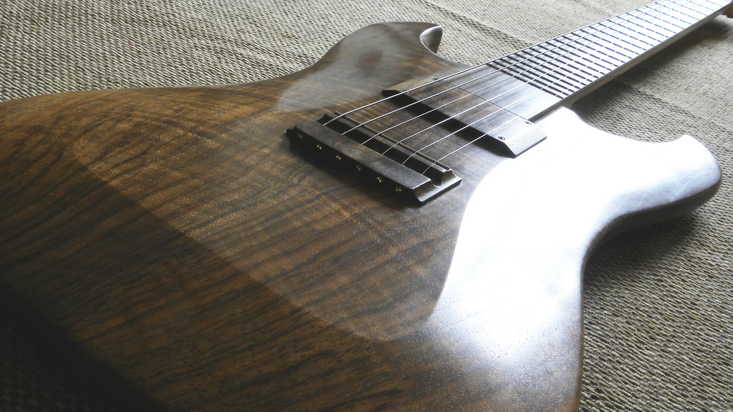 Halflight Guitars 'Naiad' English Walnut 2017  body angle w.jpg