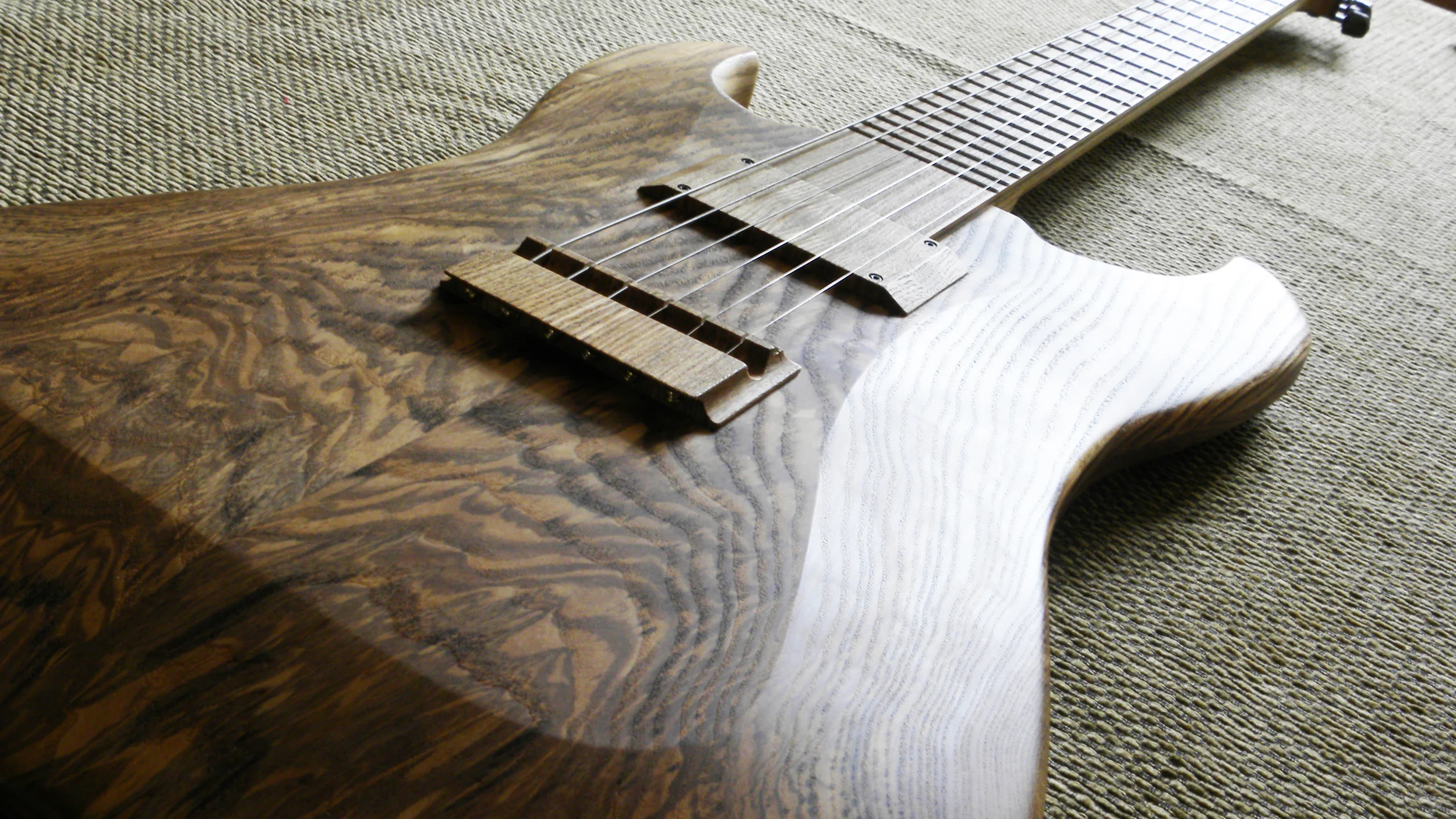 Halflight Guitars 'Naiad' Olive Ash 2017 body angle w.jpg