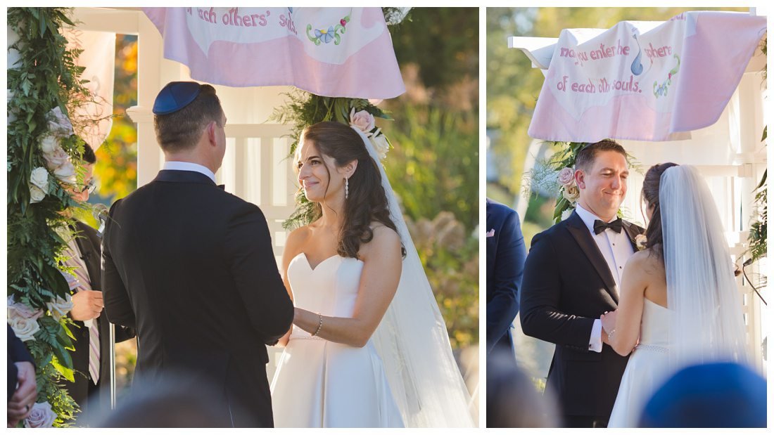 rachel and nick smile sweetly at each other during ceremony