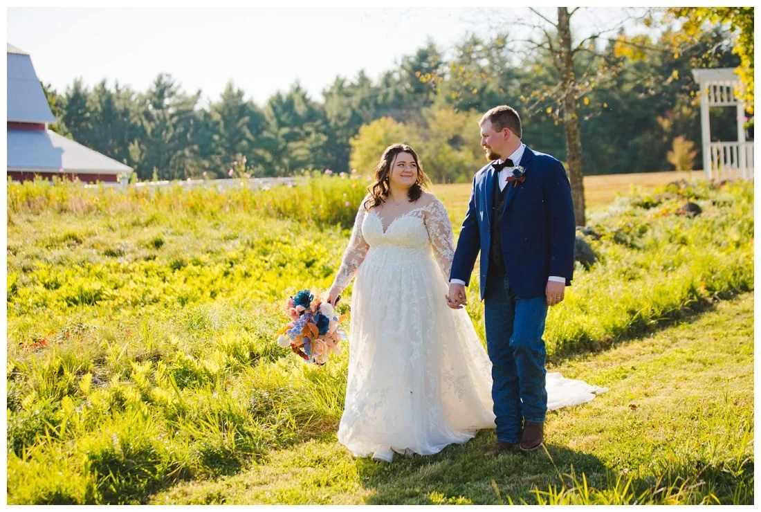 morgan and kaleb walk while holding hands and looking at each other