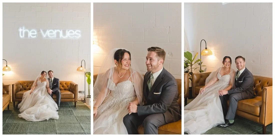 bride and groom on leather couch under sign that says "the venues" in lights