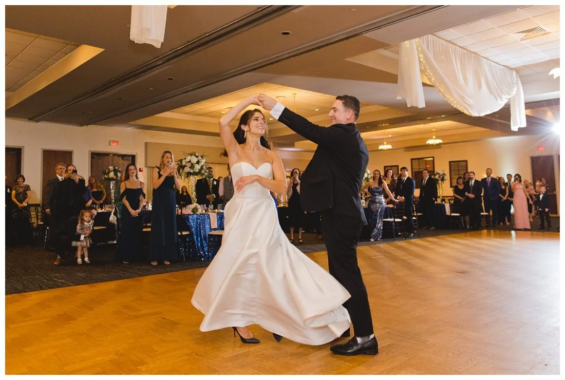 nick twirls rachel during first dance at wedding and her dress spins out