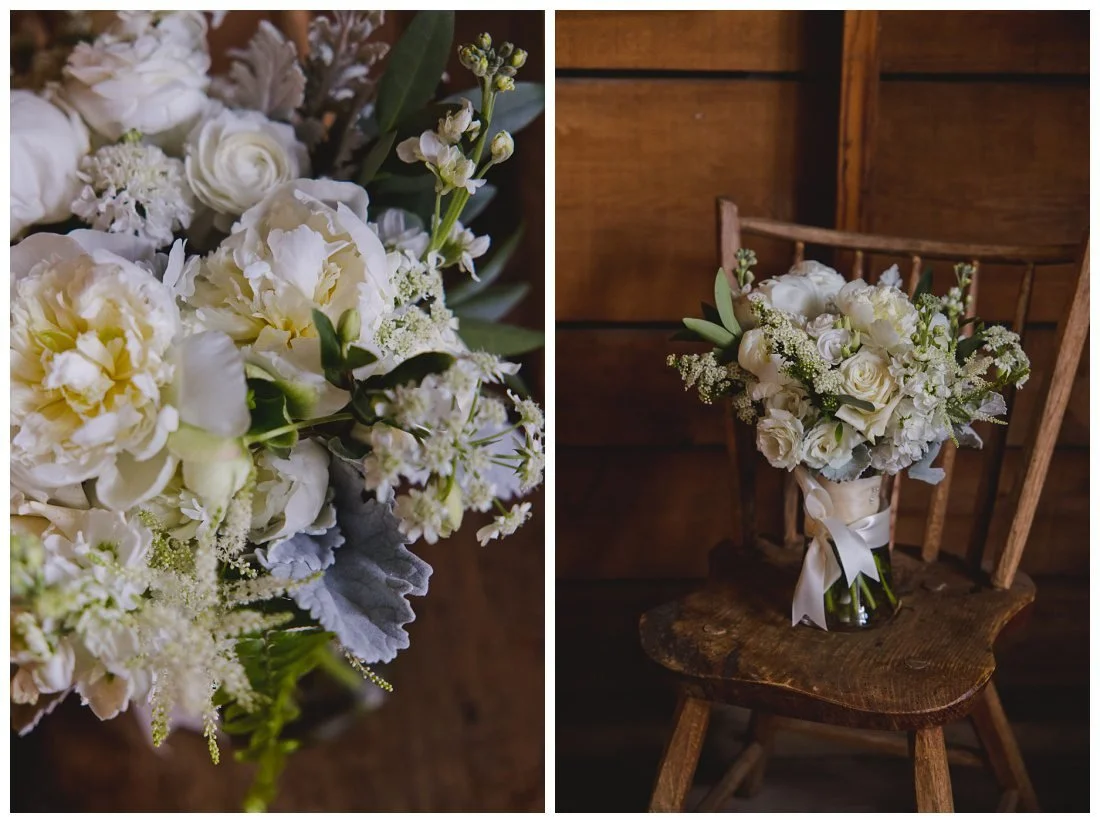 white wedding bouquet with roses and peonies on a rustic chair