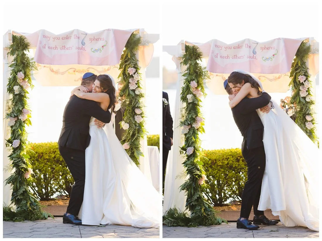 nick and rachel hug at end of wedding ceremony and he picks her up