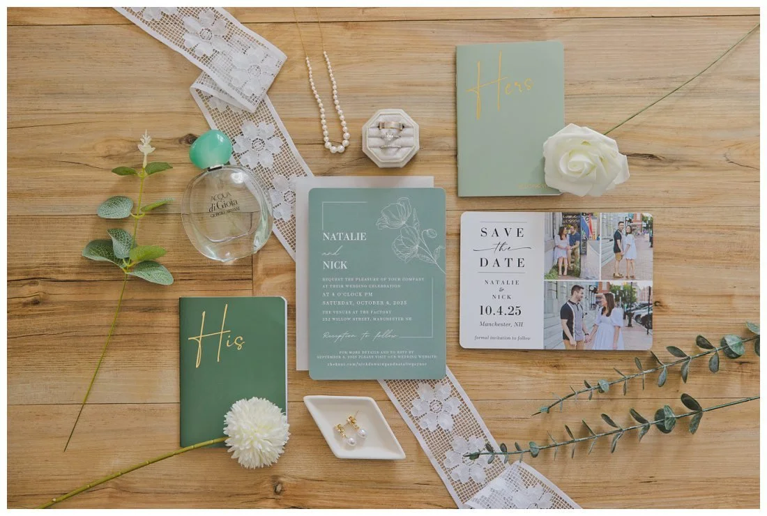 light green sage wedding invitation suite with his and hers vows book save the date flowers, perfume and jewelry flat lay wedding photo