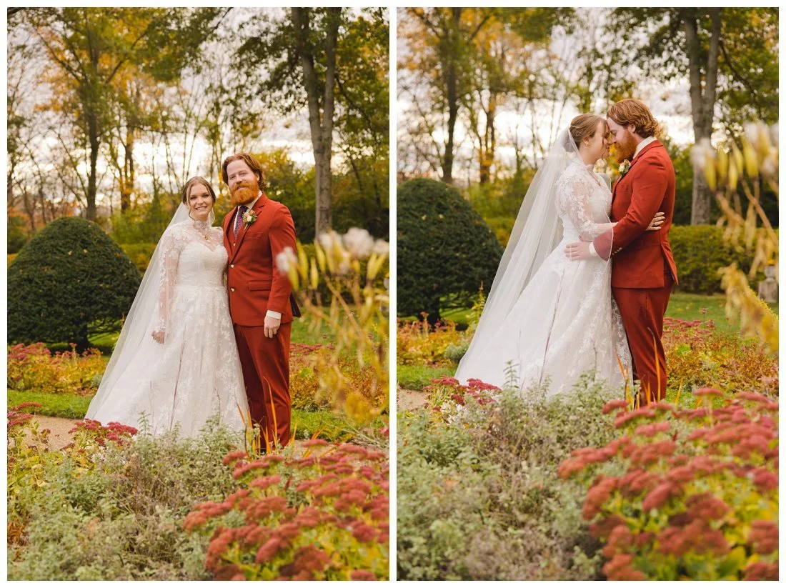 bride wears sleeveless wedding dress with lace jacket and long veil, groom wears rust orange suit in these fall wedding photos in new england