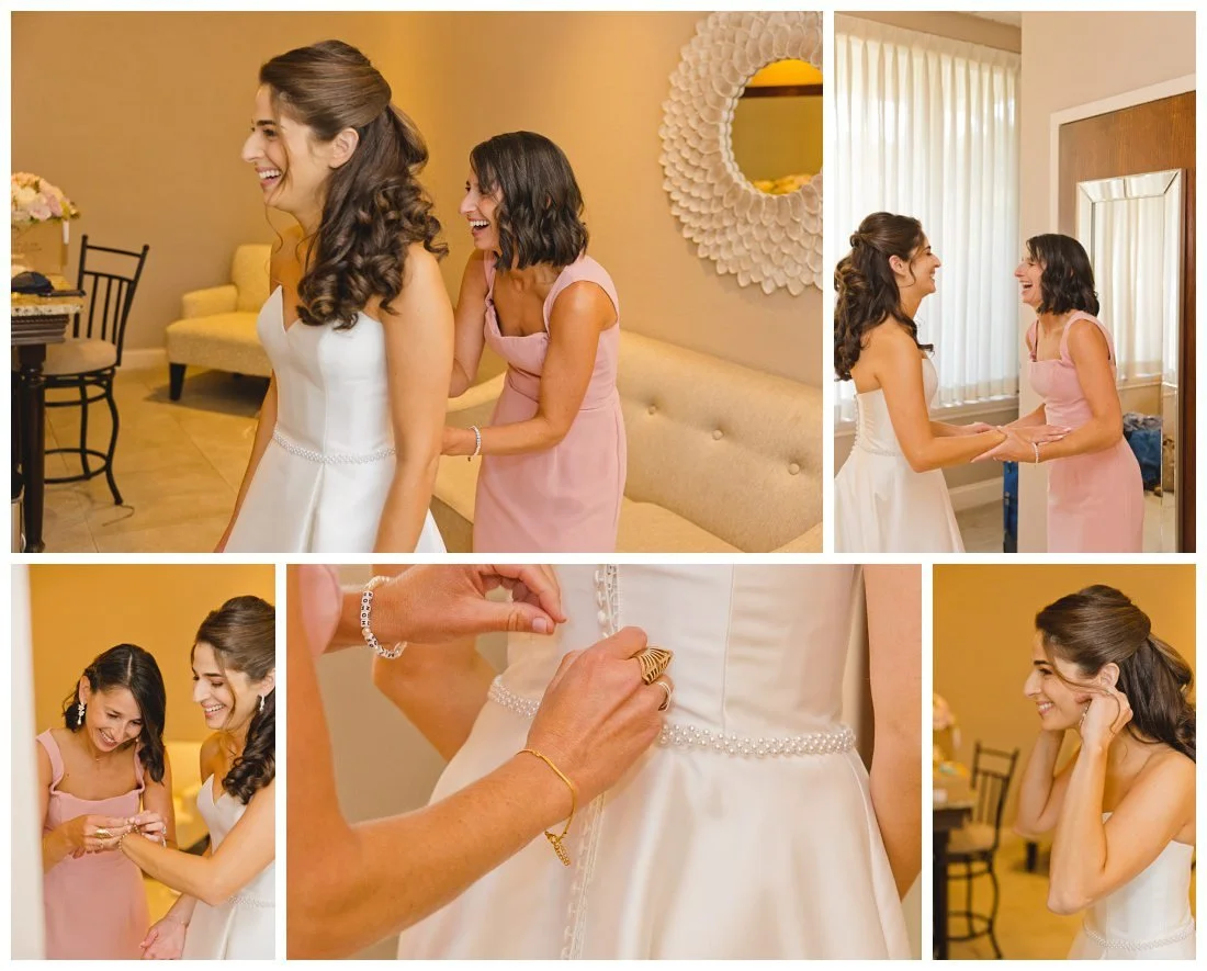 maid of honor helps her sister get ready before wedding, buttoning up dress, putting on jewelry