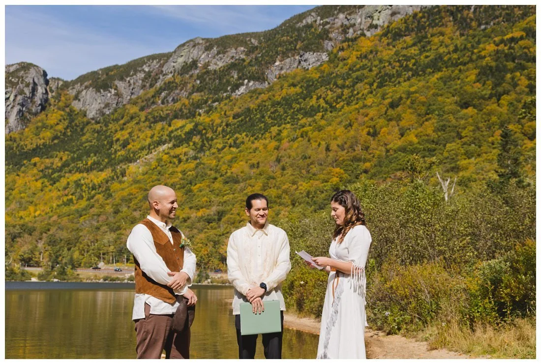 wedding ceremony at the base of cannon mountain at profile lake