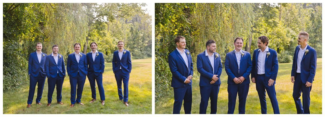 groomsmen formal photos, wearing navy blue suits and white collared shirts no ties