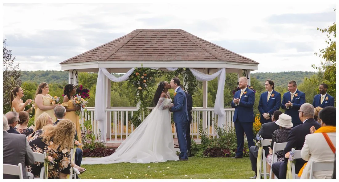 first kiss at wedding ceremony at dell lea in new hampshire