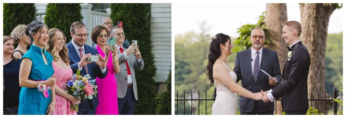 parents take a photo of the bride and groom during wedding ceremony