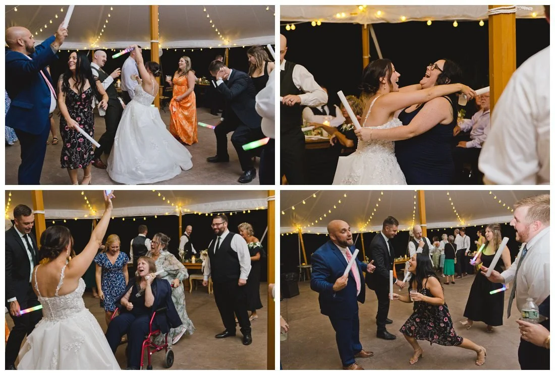 guests on the dance floor, singing and waving light up batons