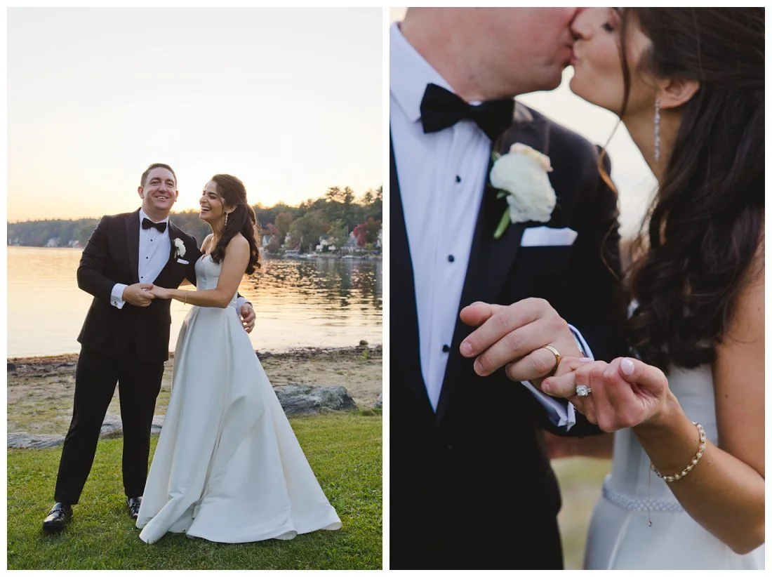 close up of rings while bride and groom link pinkies and kiss in the background