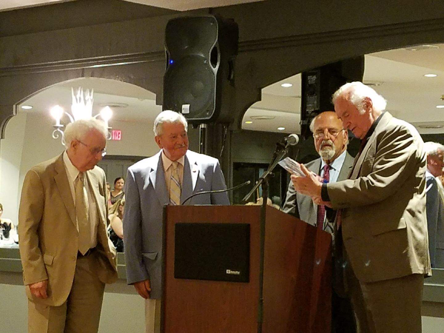 Dr. William Dracos being presented the "AHEPAN of the Year" award