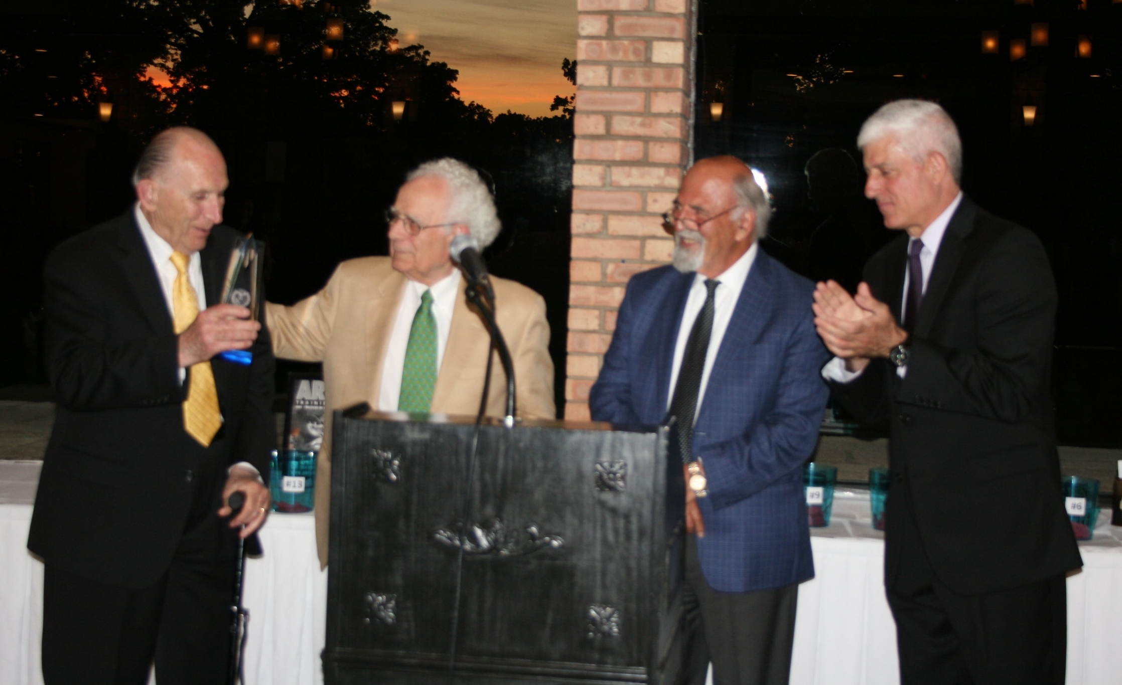 William Dracos presenting AHEPAN of the Year award to Peter Anest