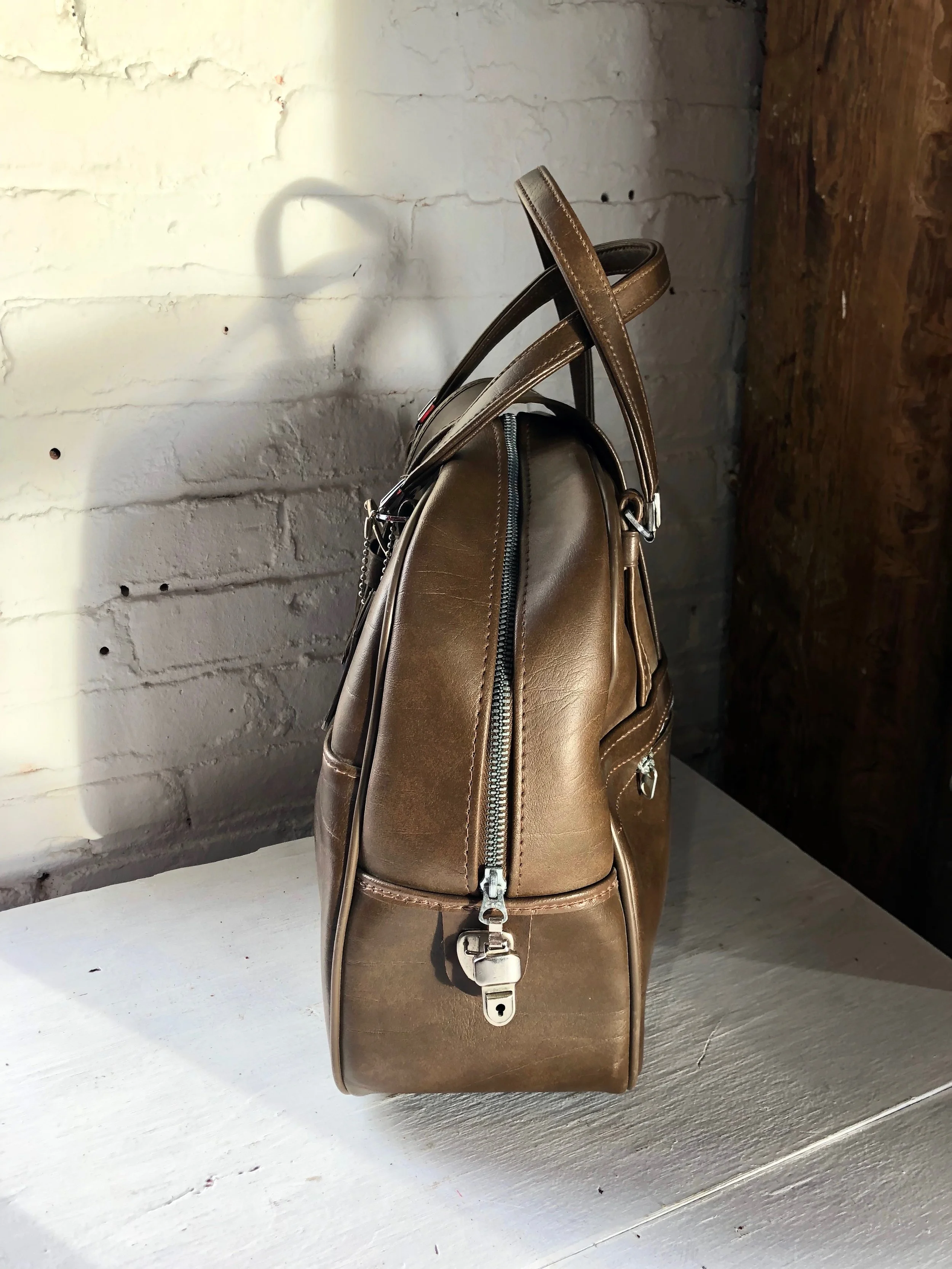 EscortBrownBag.fullside.jpg