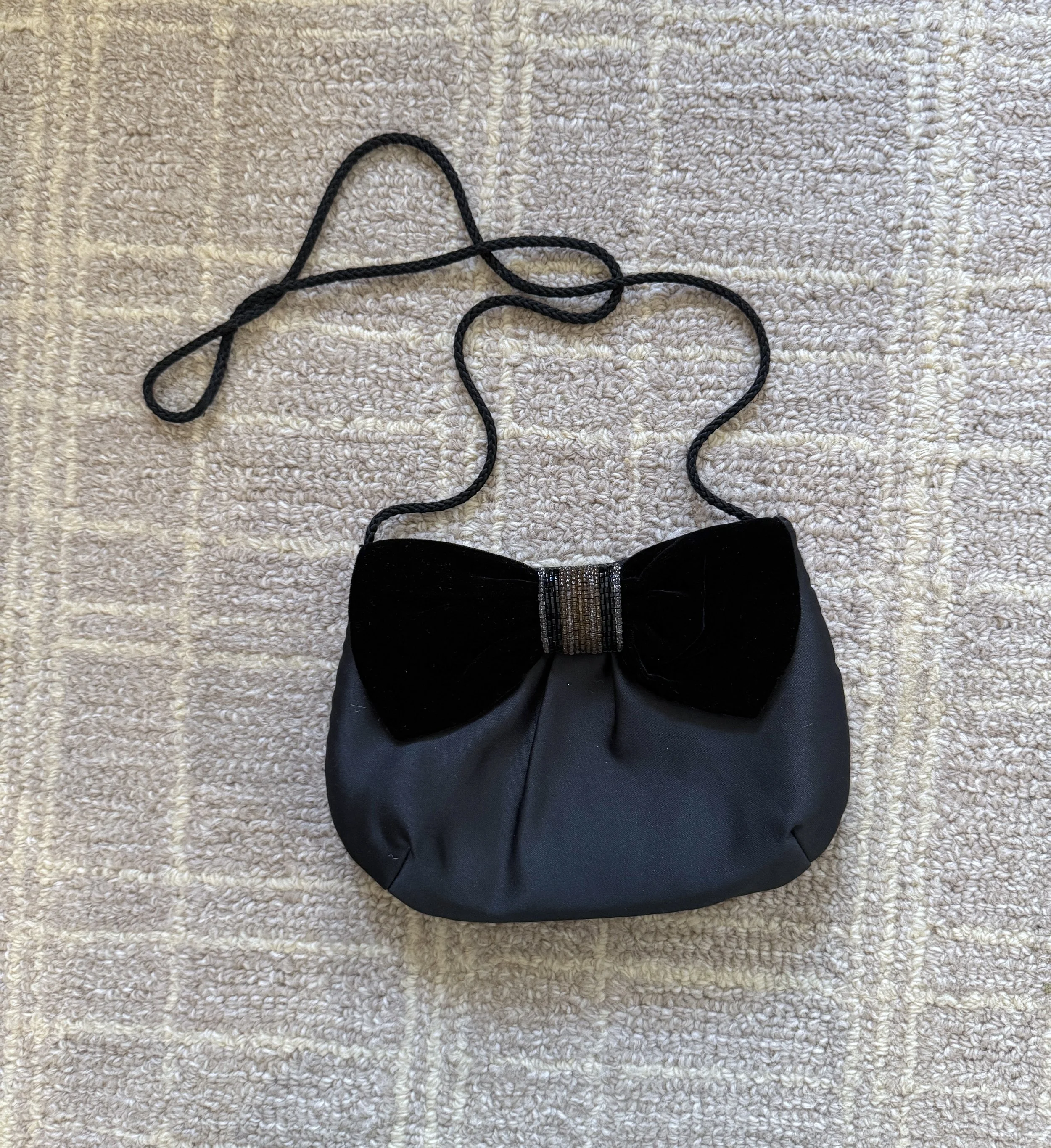 vintage black satin evening bag with oversized beaded velvet bow