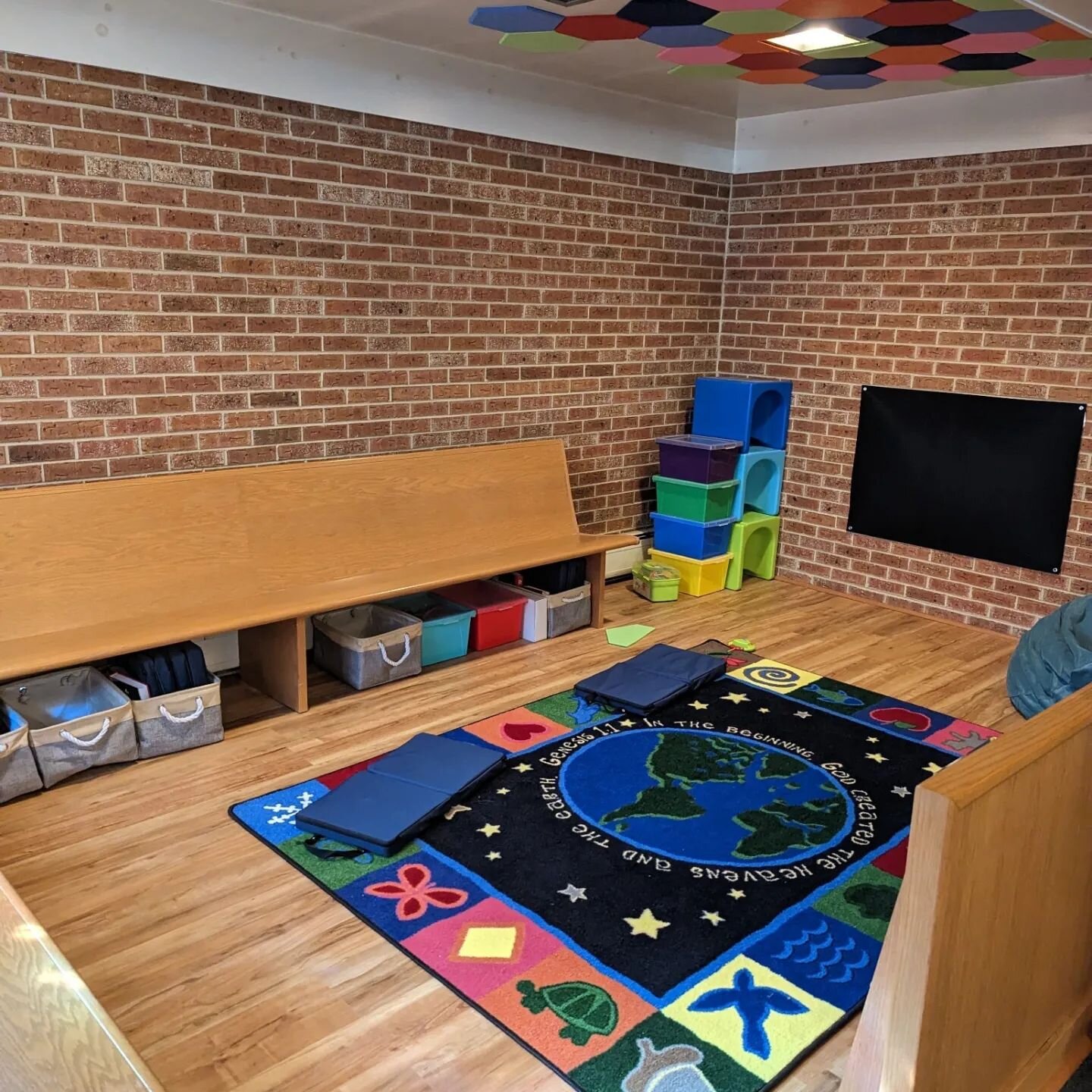 Our Pray Ground is looking great these days!

Littles and their families can sit in this area and get their wiggles out while being right up next to the altar! Best seat in the house! Older children who could benefit from books or manipulatives are w